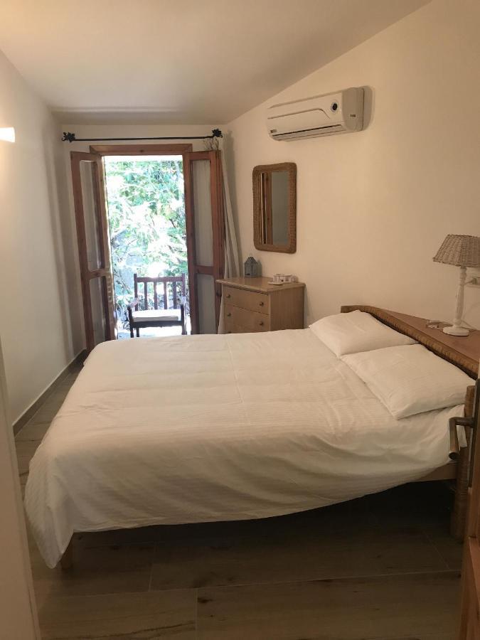 Porto Istana Beach House Ольбия Экстерьер фото