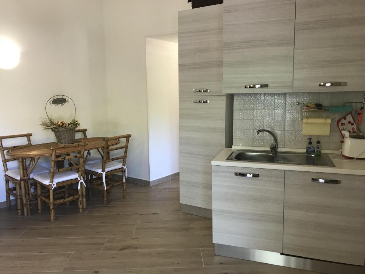 Porto Istana Beach House Ольбия Экстерьер фото