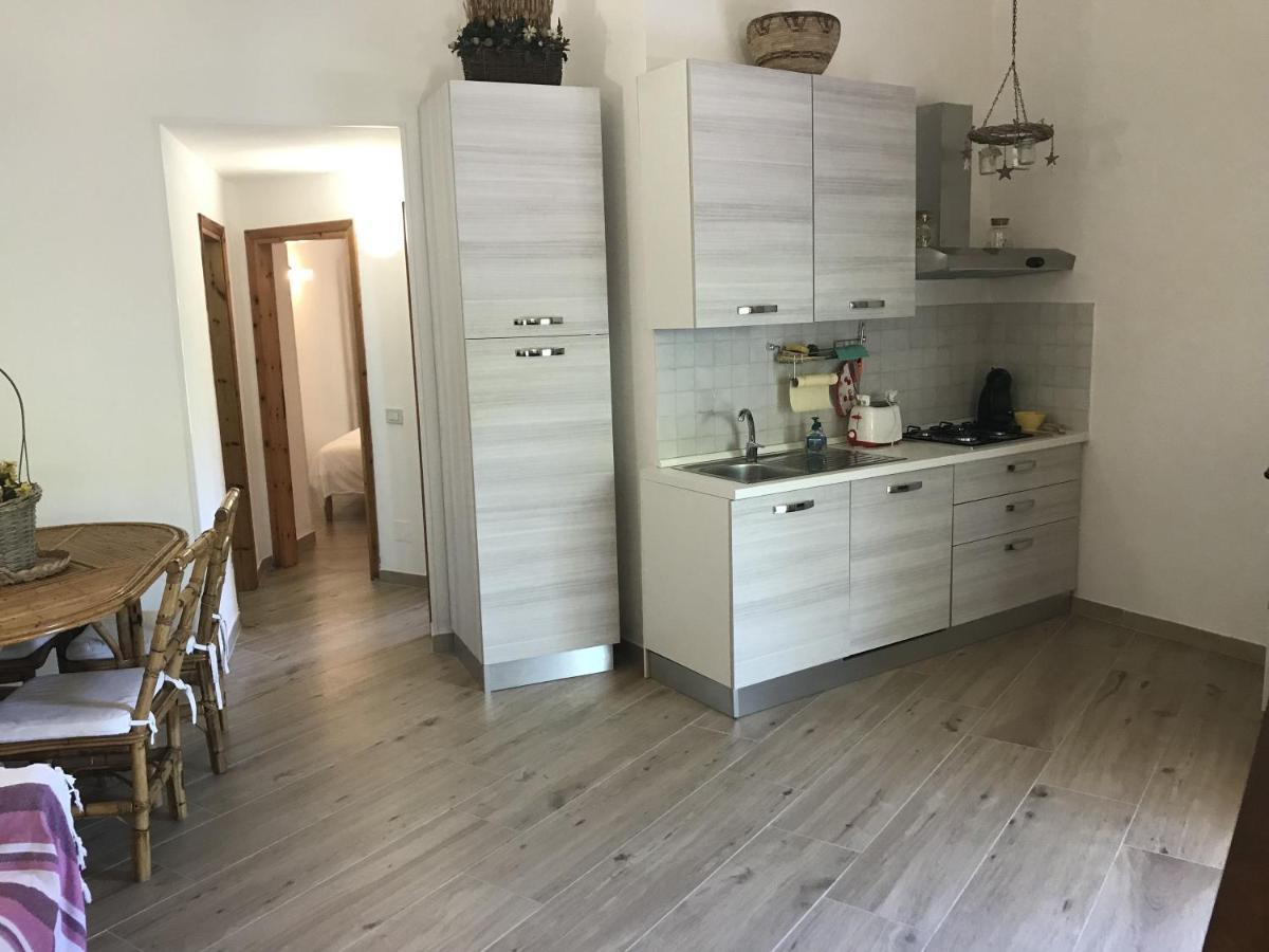 Porto Istana Beach House Ольбия Экстерьер фото