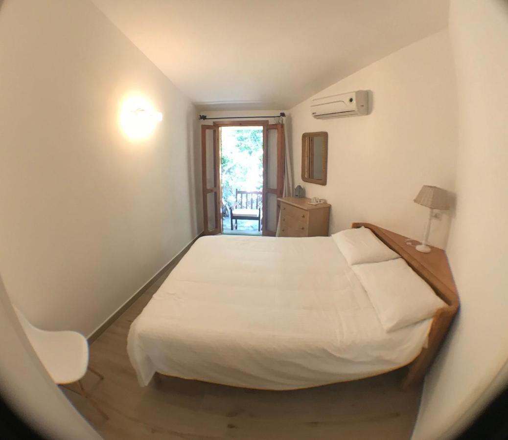 Porto Istana Beach House Ольбия Экстерьер фото